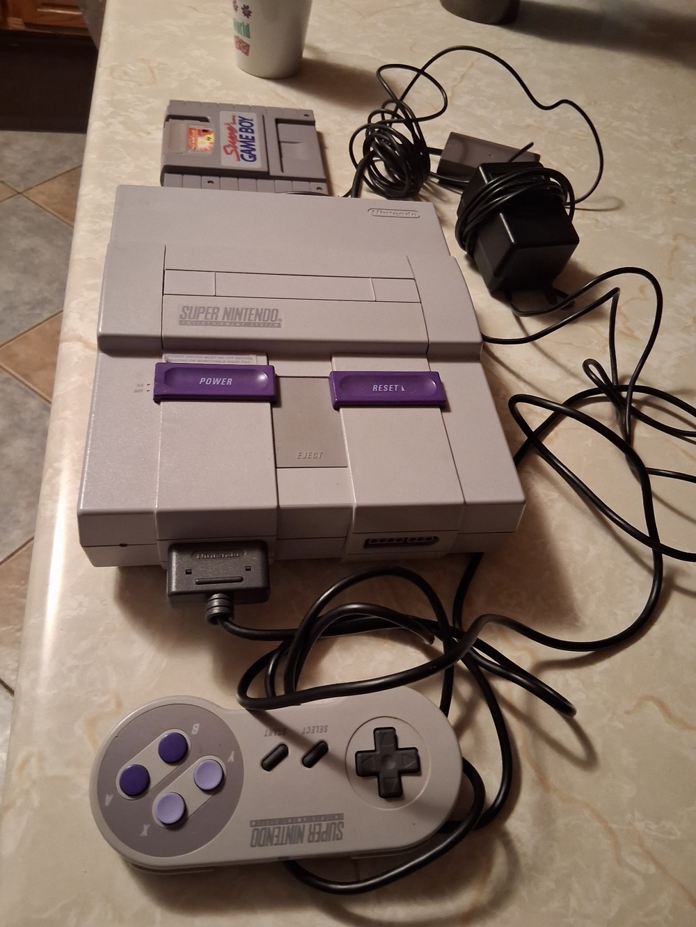 Nintendo Super Nintendo (SNES) Console with Gray Body and Purple Buttons